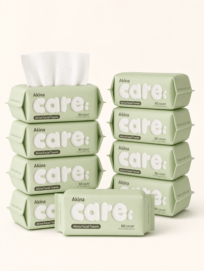 Akina Disposable Face Towels — 8 pack of pouches on a warm cream background